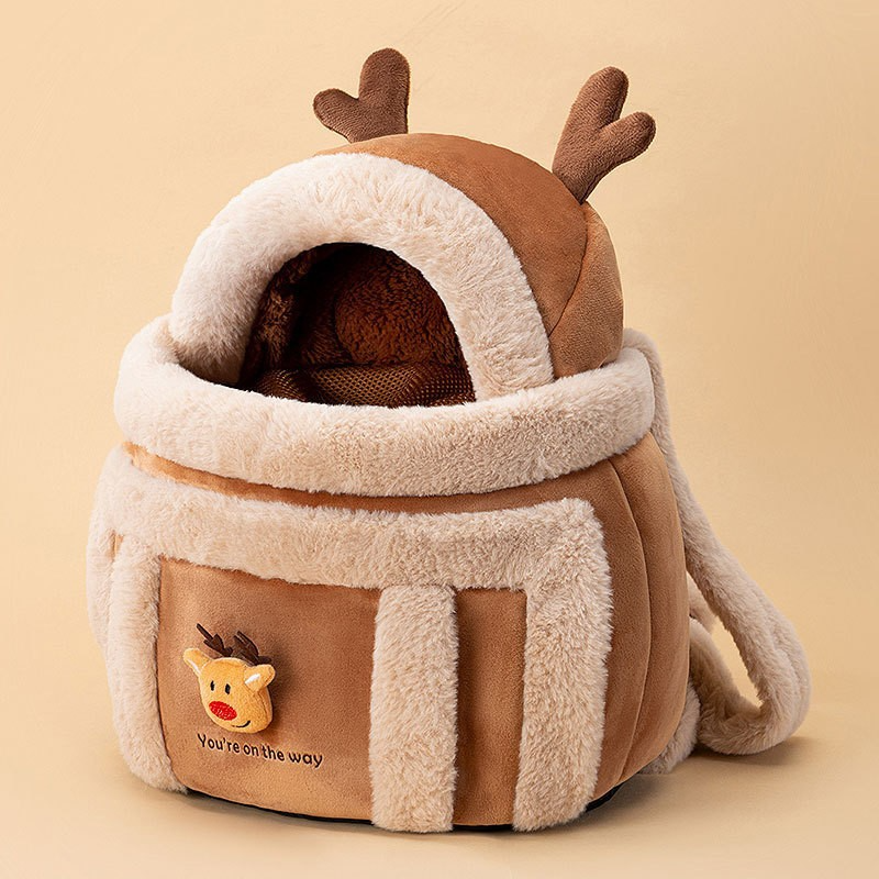 Brown reindeer pet carrier with cream trim, antlers and a hood